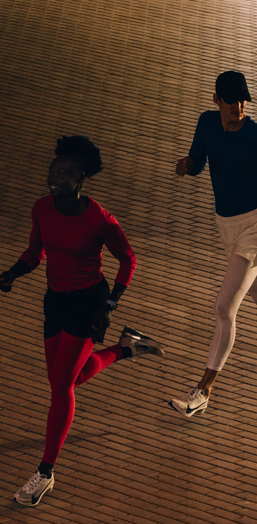 Runners work out with Apple Watch Series 11.