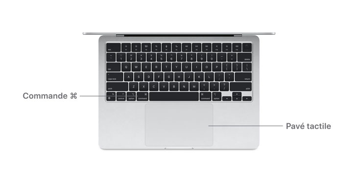 Vue en plongée d’un MacBook Air à puce M4, montrant la touche Commande et le pavé tactile.