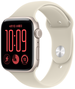 スターライトアルミニウムケースのApple Watch SE 3。モジュラーの文字盤に、曜日と日付、ワークアウト、アクティビティリング、気温のコンプリケーションが表示されている。外観の右側面にはDigital Crownとサイドボタンがあり、サンドのスポーツバンドが付いている