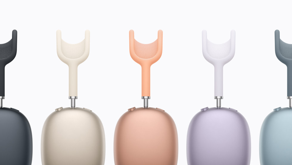 Cinco dispositivos AirPods Max 2 colocados en fila muestran las opciones de colores, de izquierda a derecha: color medianoche, blanco estelar, naranja, morado y azul.