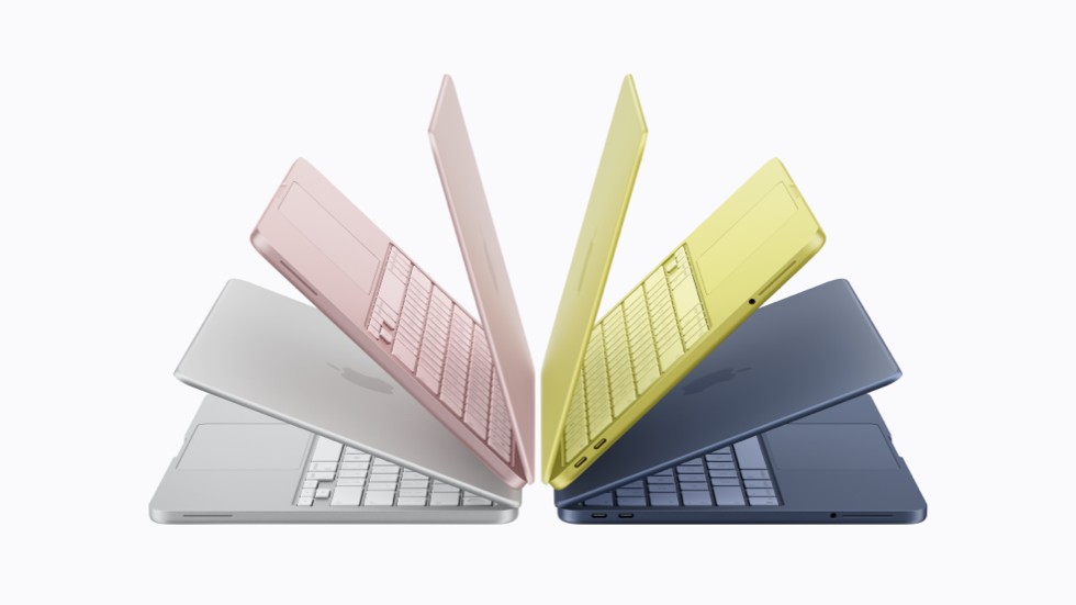 Cuatro MacBook Neo en color plata, rosa rubor, amarillo cítrico e índigo.