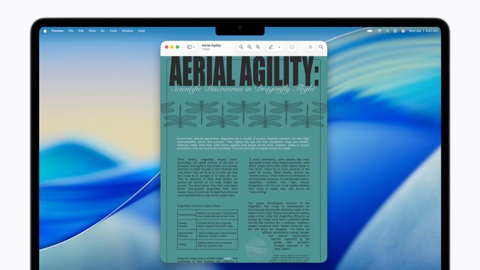 La pantalla de una Mac muestra un documento fuente con un diseño complejo y texto pequeño.