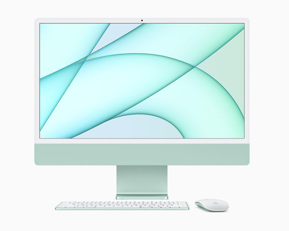 그린 색상의 iMac과 Magic Keyboard 그리고 Magic Mouse.