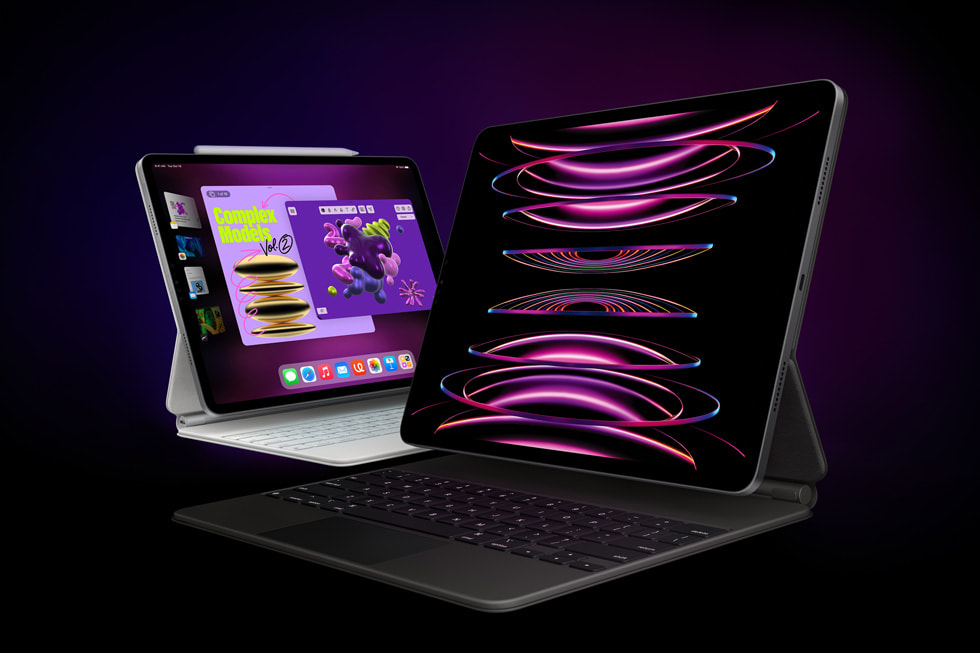 Gümüş rengi iPad Pro ile beyaz Magic Keyboard ve Apple Pencil; uzay grisi iPad Pro ile siyah Magic Keyboard.
