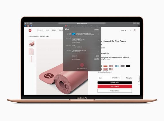Ekranında Apple Pay penceresi açık bir MacBook Air.