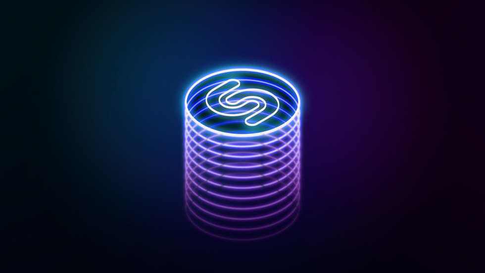 黒い背景にネオンで描かれているShazamのロゴ。