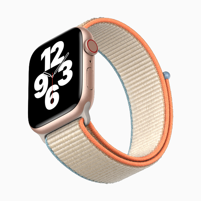 Roze altın rengi alünimyum kasa ve Spor Loop’lu Apple Watch SE.