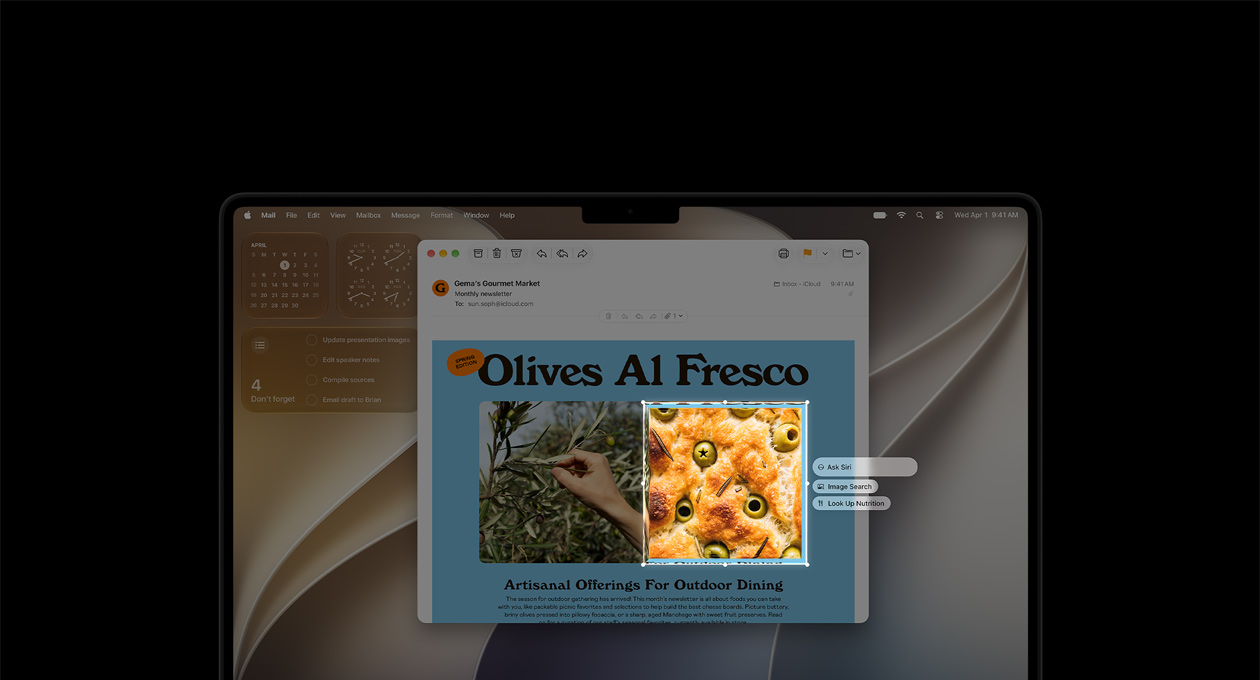 14‑calowy MacBook Pro w kolorze gwiezdnej czerni, na ekranie widać działanie funkcji Inteligencja wizualna – wiadomość e‑mail ze zdjęciami jedzenia i ziół, kontur pudełka wokół obrazu z oliwkami w chlebie i trzy sugestie pod obrazem, w tym Poproś Siri, Wyszukiwanie obrazów i Sprawdź wartość odżywczą