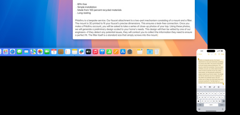 iPhone używający Uniwersalnego schowka do kopiowania notatek do komputera Mac mini M4 z monitorem Studio Display.