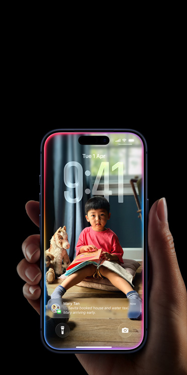 Hand holding iPhone 17 Pro, Messages pop-up on personalised Lock Screen