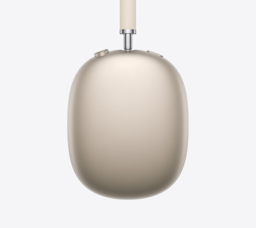 AirPods Max 2, Farbe Polarstern, seitliche Detailansicht des Kopfbügels, des Ohrpolsters, der Digital Crown und der Taste zur Geräuschkontrolle