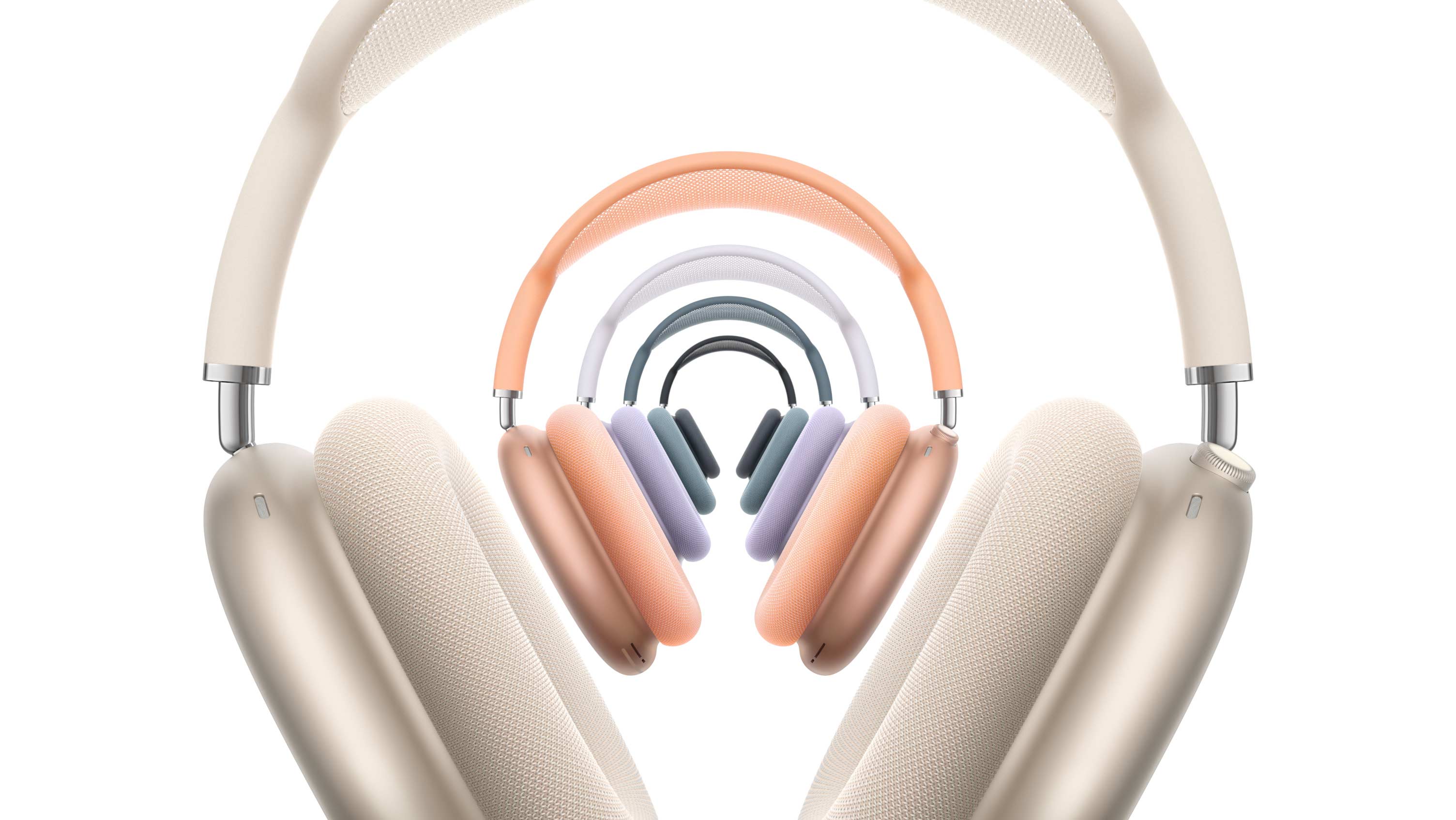 Fünf AirPods Max 2 Kopfhörer, Vorderseite, übereinander angeordnet, in Polarstern, Orange, Violett, Blau und Mitternacht
