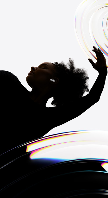 AirPods Pro 3 inserted in the ear of a dancer as they enjoy a hands‑free listening experience
