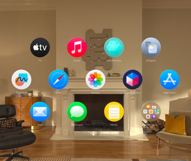 The Home View of Apple Vision Pro. A collection of app icons, floating in 3-dimensional space in a living room.