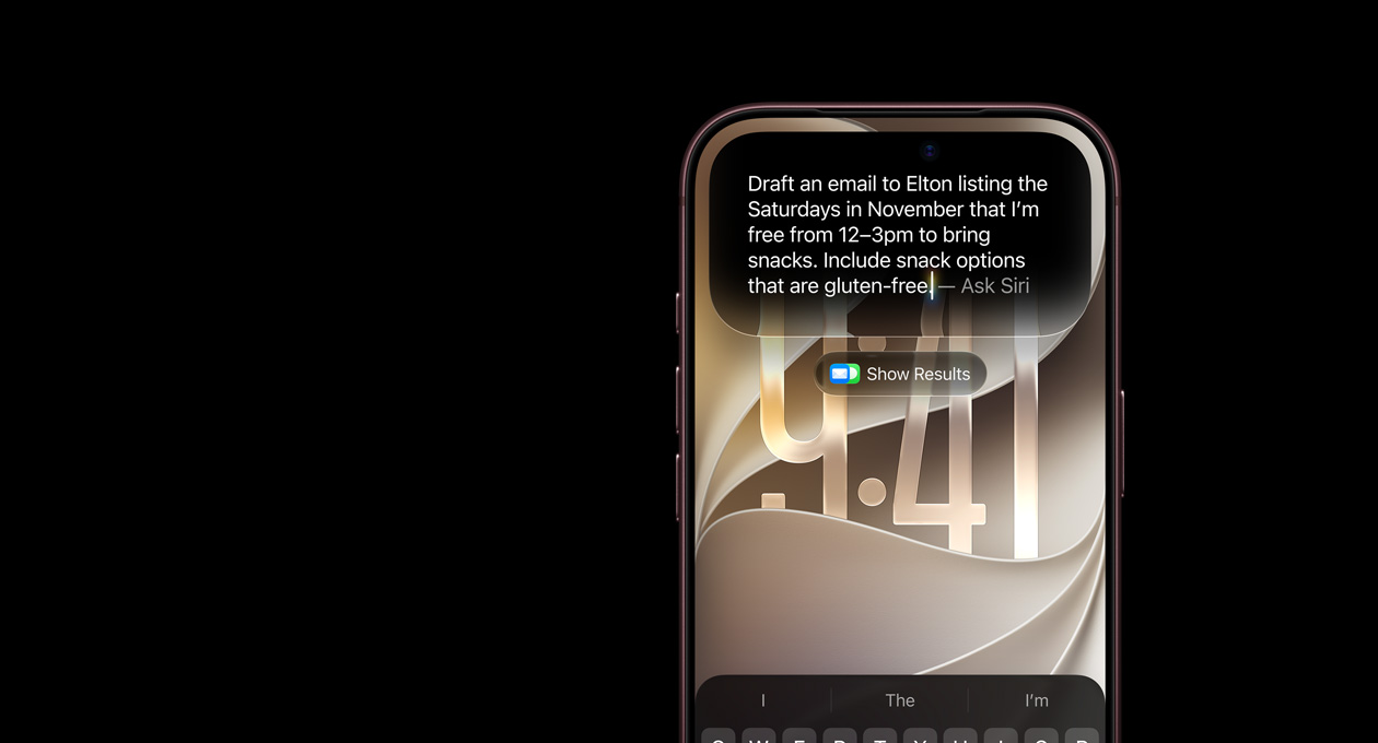 iPhone 18 Pro, Burgundy, screen displaying an Ask Siri prompt reading: Draft an email to Elton listing the Saturdays in November that I'm free from 12–3pm to bring snacks. Include snack options that are gluten-free