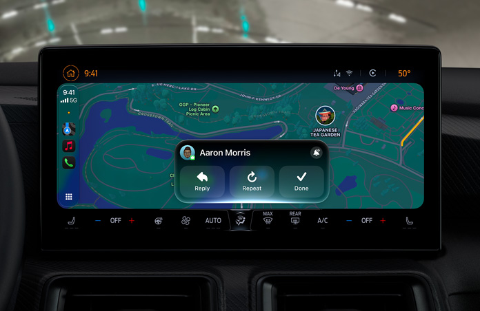 A CarPlay screen showing a Messages notification, with Maps visible in the background