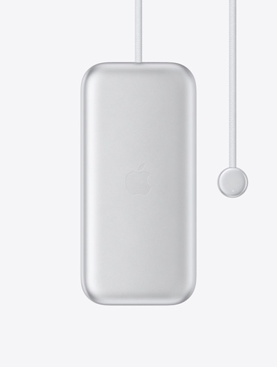 Apple Vision Pro battery, exterior, centred Apple logo, built-in power cable with round connector at one end, LED indicator on connector