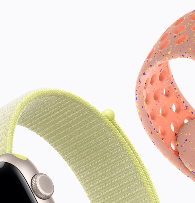 Apple Watch SE 3，星光色鋁金屬錶殼，霓虹黃色運動手環，山霞粉紅色 Nike 運動錶帶
