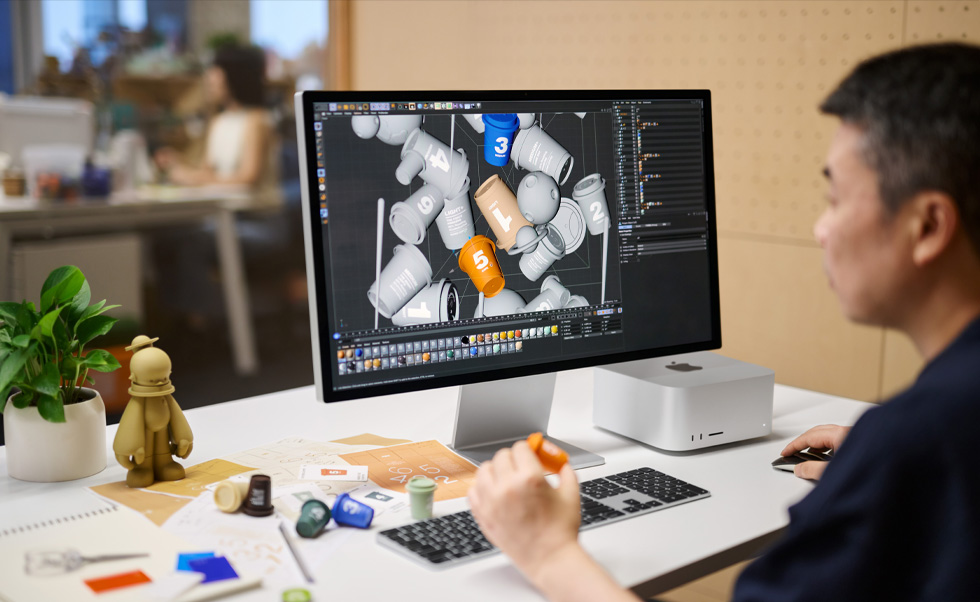 Una persona renderiza en 3D en un Mac.