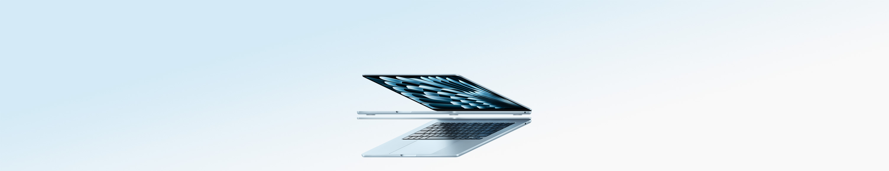 兩部掀開的天藍色 MacBook Air 筆電組成箭頭形狀，強調纖薄外觀