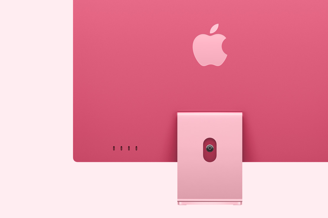 粉紅色 iMac 背面，展示四個 USB-C 連接埠。