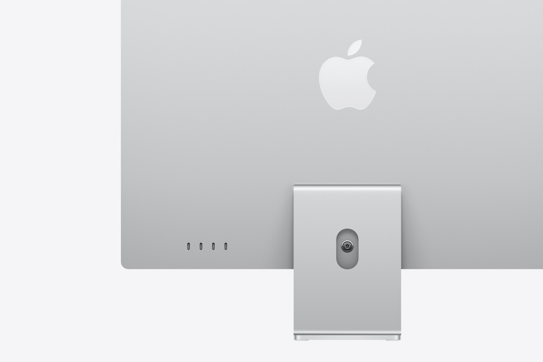 銀色 iMac 的背面，展示四個 USB-C 連接埠