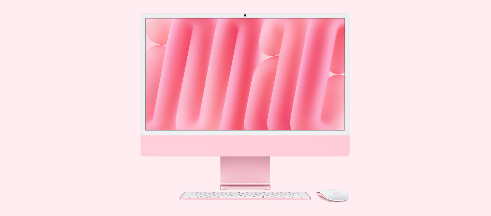 正面圖展示粉紅色 iMac 配上襯色的滑鼠和鍵盤