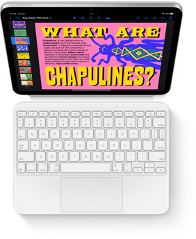 Pohled shora na iPad spřipnutý k bílému Magic Keyboard Foliu.