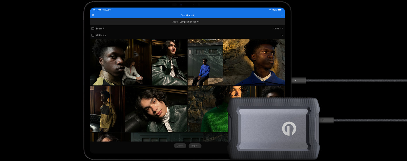 iPad Pro, Vorderansicht, Querformat, Farbe Space Schwarz, über ein Kabel mit einer externen USB‑C Festplatte verbunden, das Display zeigt Fotos von Modellen, die in einen Ordner mit dem Namen „Kampagnen Shooting“ importiert werden