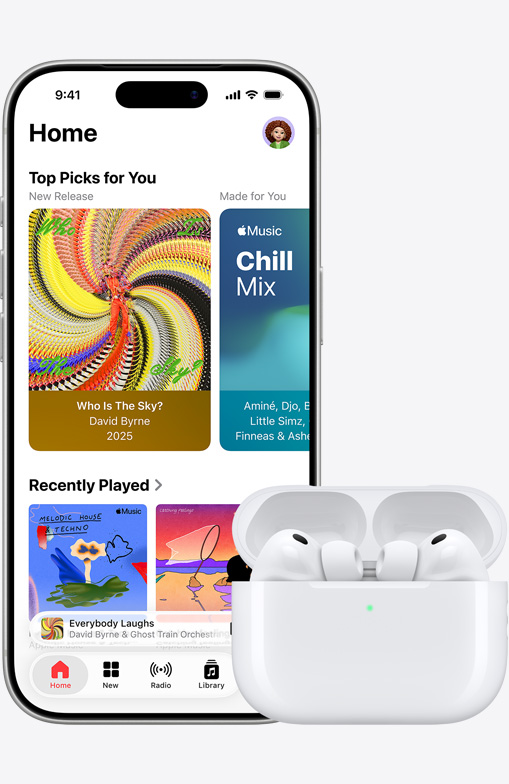 iPhone 17 Pro, front exterior, Apple Music app with Home Screen open, next to AirPods
