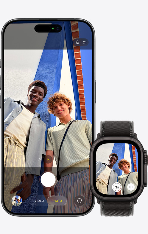 iPhone 17, front exterior, camera in use to capture group selfie, next to Apple Watch