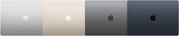 Exteriors of four MacBook Air models, showcasing four different finishes