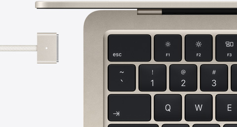 MacBook Air in Starlight colour with colour-matched MagSafe cable