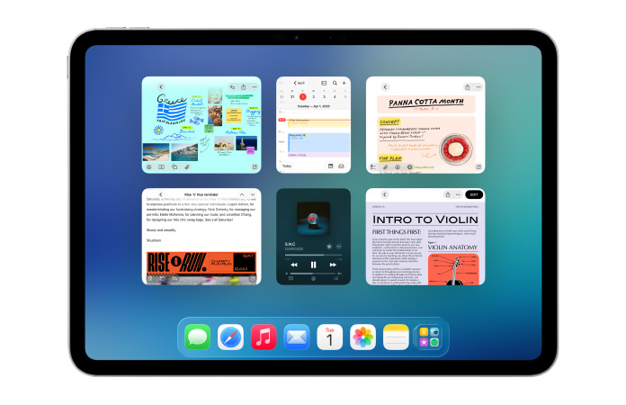 iPad, landscape orientation, shows six windows open in two rows, including Calendar app, Notes app, Apple Music and Safari