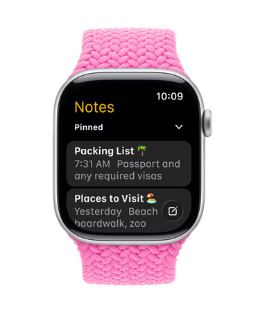 Apple Watch w kolorze srebrnym z plecionym paskiem w odcieniu piwonii, na tarczy widoczna apka Notatki z dwiema przypiętymi notatkami