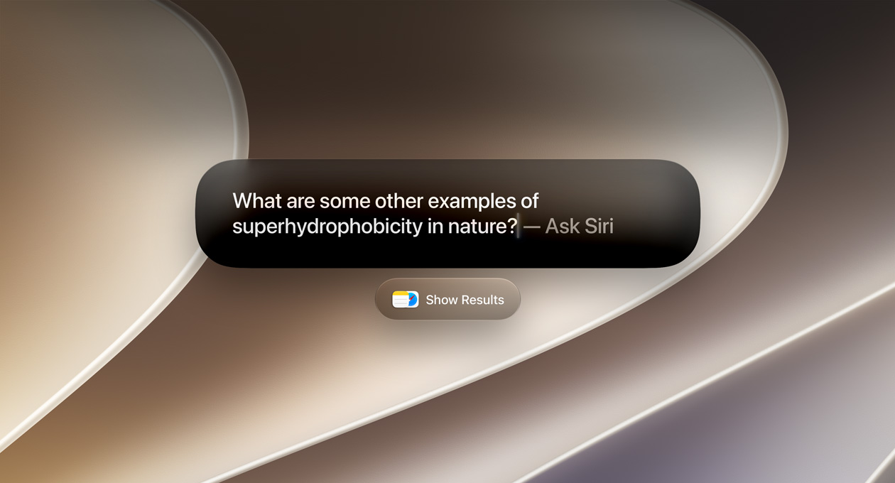 MacBook Pro screen displaying a query for Siri, another window with the option to show results appears below it