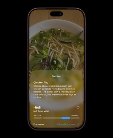 iPhone 18 Pro, Burgundy, screen displays in Siri mode in Camera interface, showing nutrition facts about a food item identified with Visual Intelligence, screen shows detailed information about chicken phở recipe, including common ingredients and nutrition information